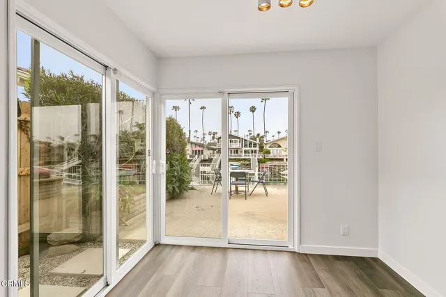 a view of a hallway with staircase