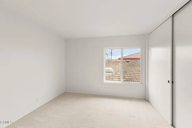 a view of a refrigerator in kitchen