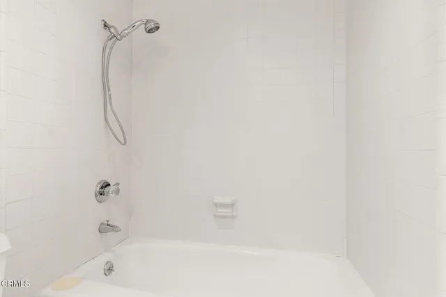 a view of a lake and boats