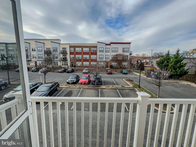 a room with furniture a rug and a window