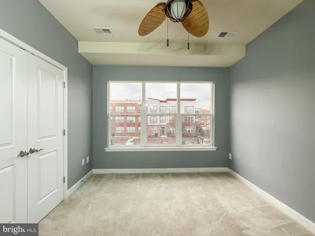 a view of an empty room and window