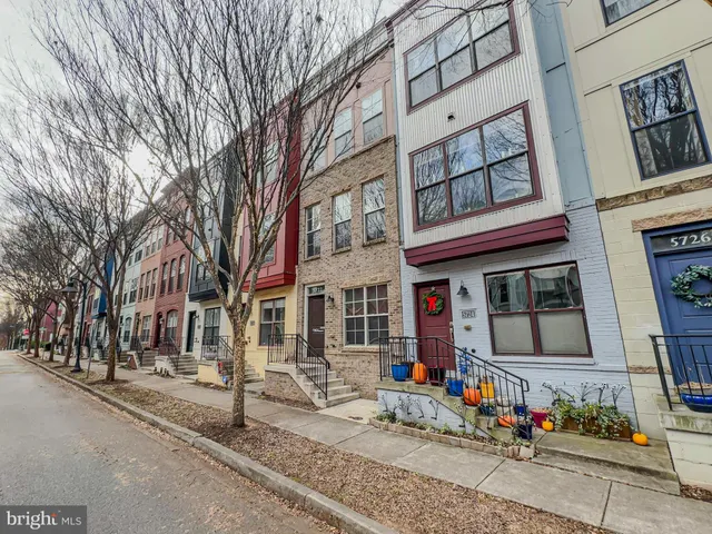 a front view of a building with street view