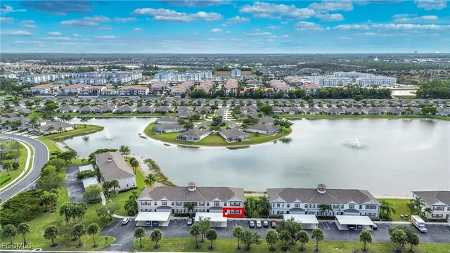 an aerial view of a city with lawn chairs