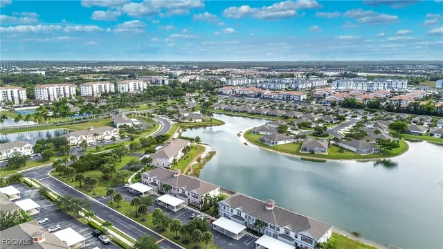 view of a lake with a city