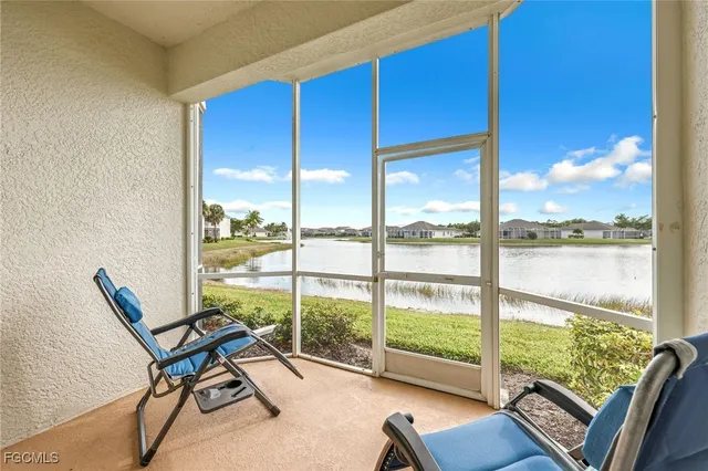 a view of a room with a large window