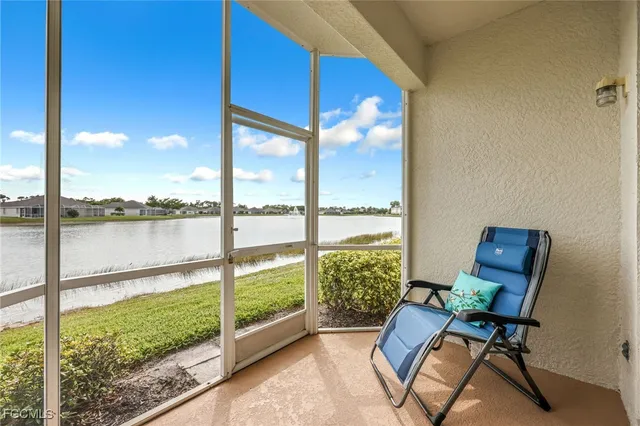 a room with furniture and a balcony