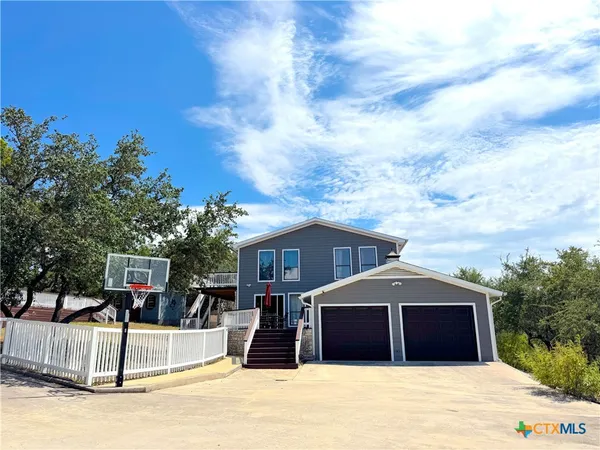 a front view of a house with a porch