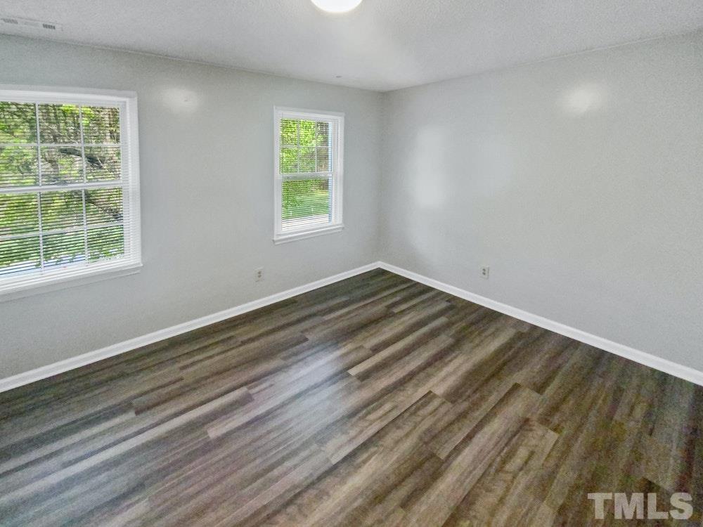 8236 Merriweather Circle Raleigh, NC 27616 - Photo 14 of 15 an empty room with a window
