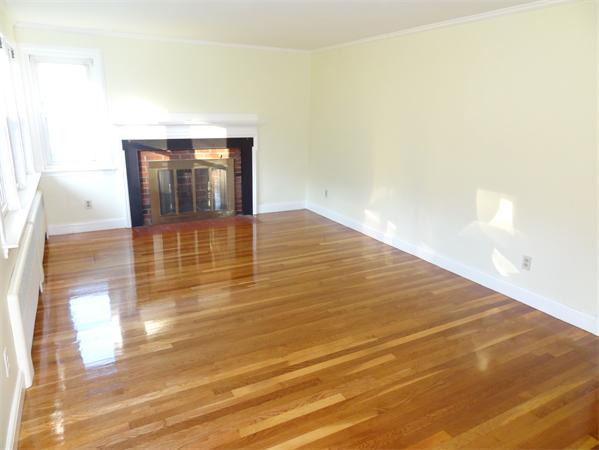 15 Dustin Road Reading, MA 01867 - Photo 3 of 11 a view of empty room with wooden floor