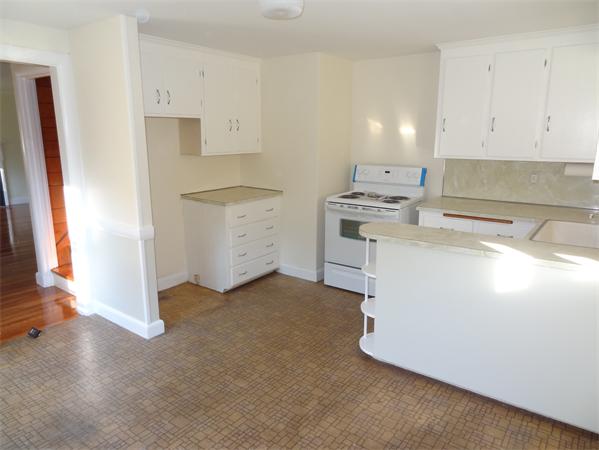 15 Dustin Road Reading, MA 01867 - Photo 7 of 11 a kitchen with cabinets appliances