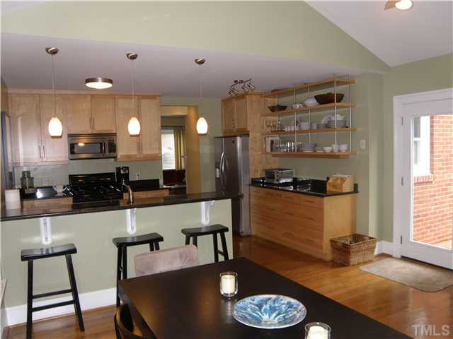 617 Rosemont Avenue Raleigh, NC 27607 - Photo 4 of 24 kitchen, dining room and family room.