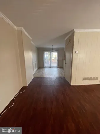 a view of livingroom with hardwood floor and window