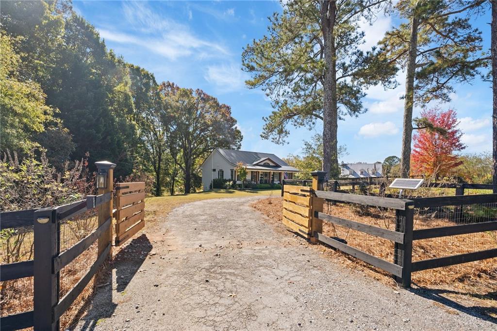 7933 Midway Road Alpharetta, GA 30004 - Photo 15 of 101 a view of a terrace with a bench