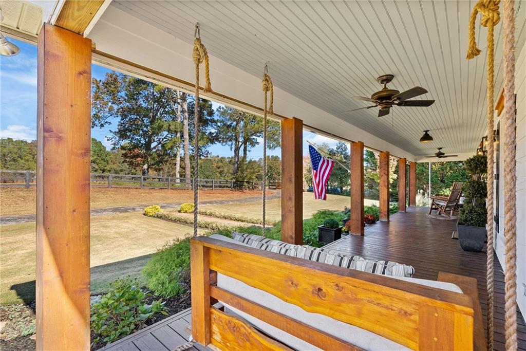 7933 Midway Road Alpharetta, GA 30004 - Photo 21 of 101 a view of swimming pool with a table and chairs