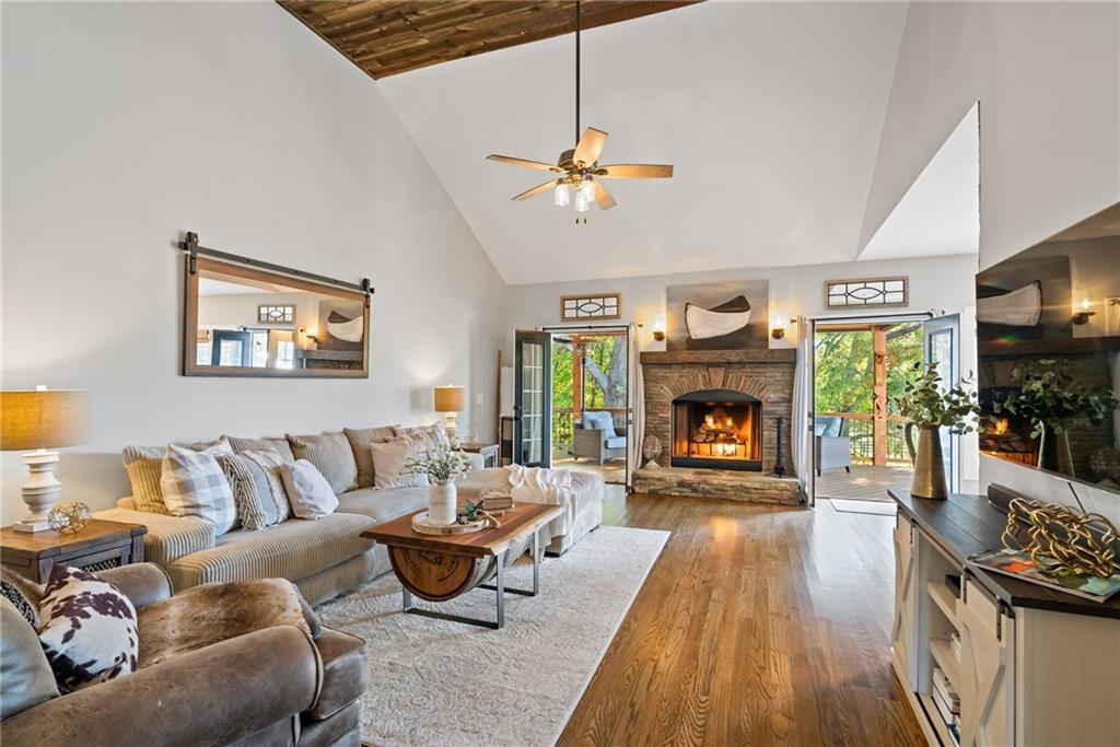 7933 Midway Road Alpharetta, GA 30004 - Photo 27 of 101 a living room with furniture and a fireplace