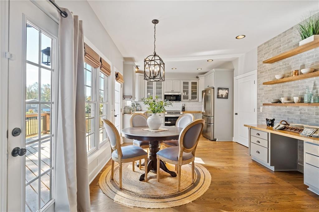 7933 Midway Road Alpharetta, GA 30004 - Photo 32 of 101 a view of a dining room with furniture window and outside view