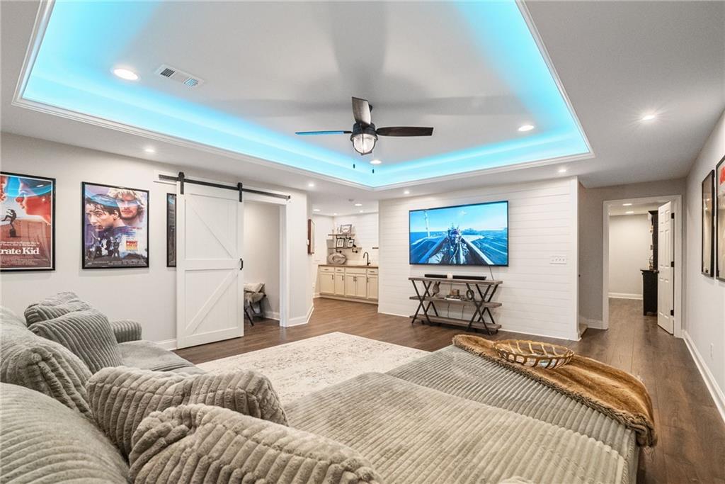 7933 Midway Road Alpharetta, GA 30004 - Photo 61 of 101 a bedroom with a bed and a couch