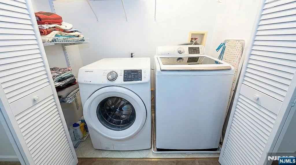 136 Mountainside Drive Pompton Lakes, NJ 07442 - Photo 28 of 36 a utility room with dryer and washer