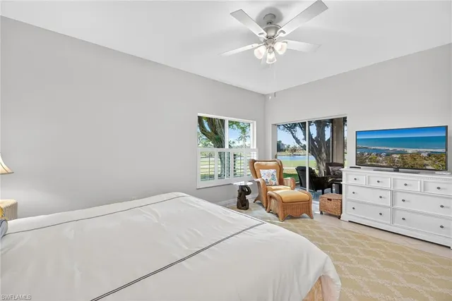 a bedroom with a bed and furniture