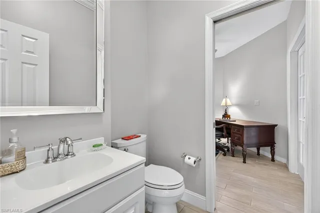 a patio view with patio couches and a table