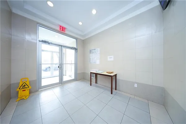a view of kitchen with furniture and window