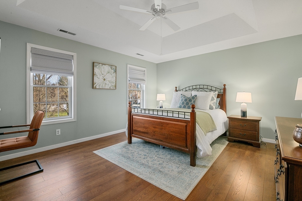25 Mill Road East Longmeadow, MA 01028 - Photo 21 of 38 a bed sitting in a bedroom next to a window