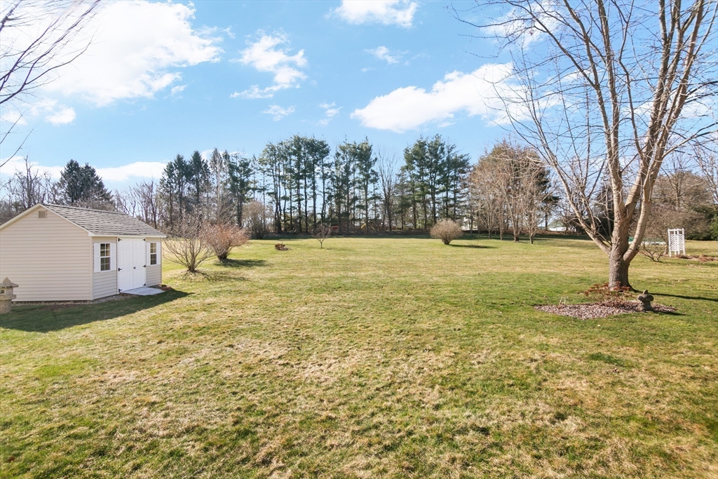25 Mill Road East Longmeadow, MA 01028 - Photo 35 of 38 a view of a large body of water with a building in the background