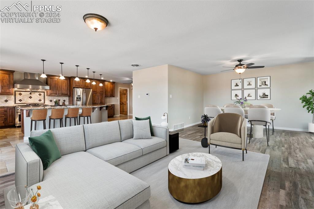 12990 Mc Cune Road Elbert, CO 80106 - Photo 12 of 50 a living room with furniture and a rug