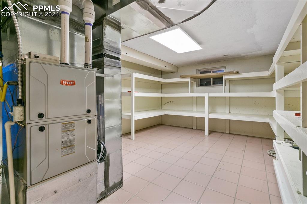 12990 Mc Cune Road Elbert, CO 80106 - Photo 38 of 50 a view of walk in closet with empty racks