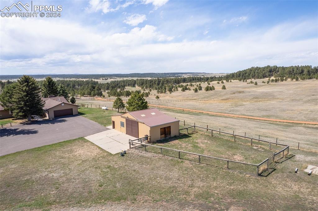 12990 Mc Cune Road Elbert, CO 80106 - Photo 39 of 50 a view of a terrace with lawn chairs
