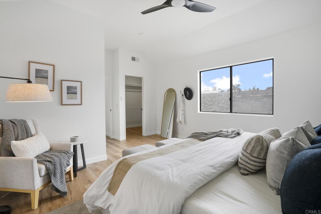 803 Skysail Avenue Carlsbad, CA 92011 - Photo 12 of 15 a bedroom with bed and a window