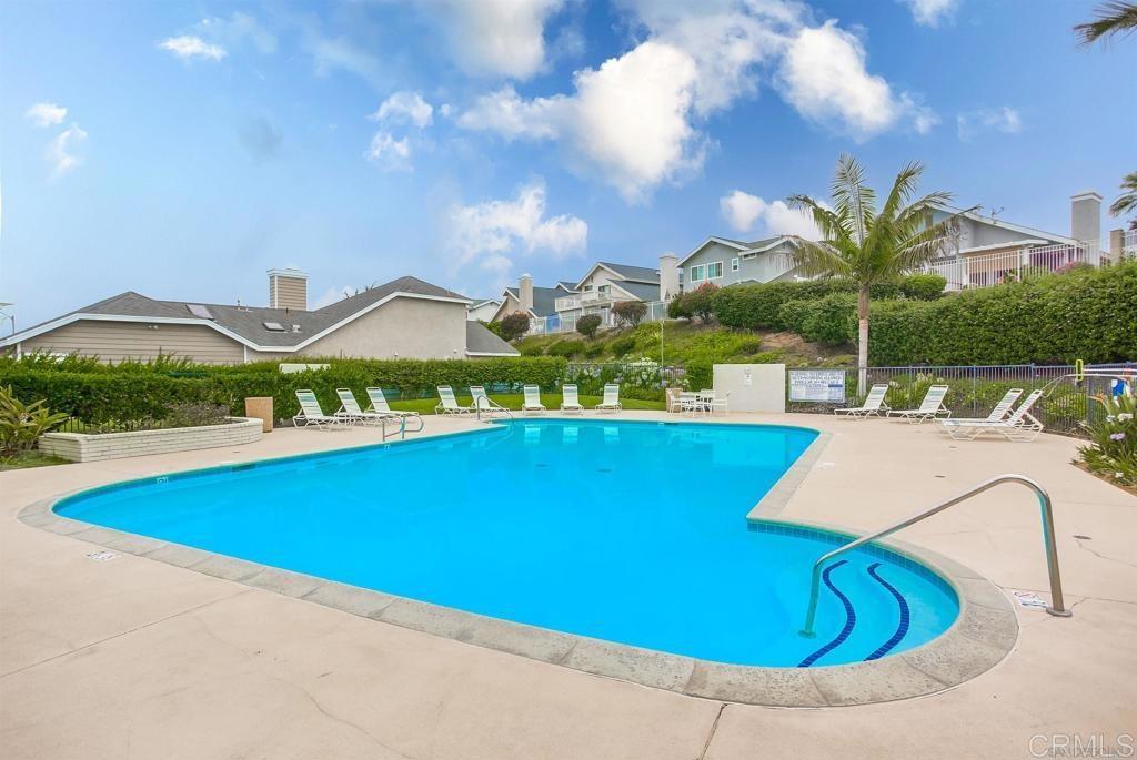 803 Skysail Avenue Carlsbad, CA 92011 - Photo 15 of 15 a view of swimming pool with a yard and mountain view