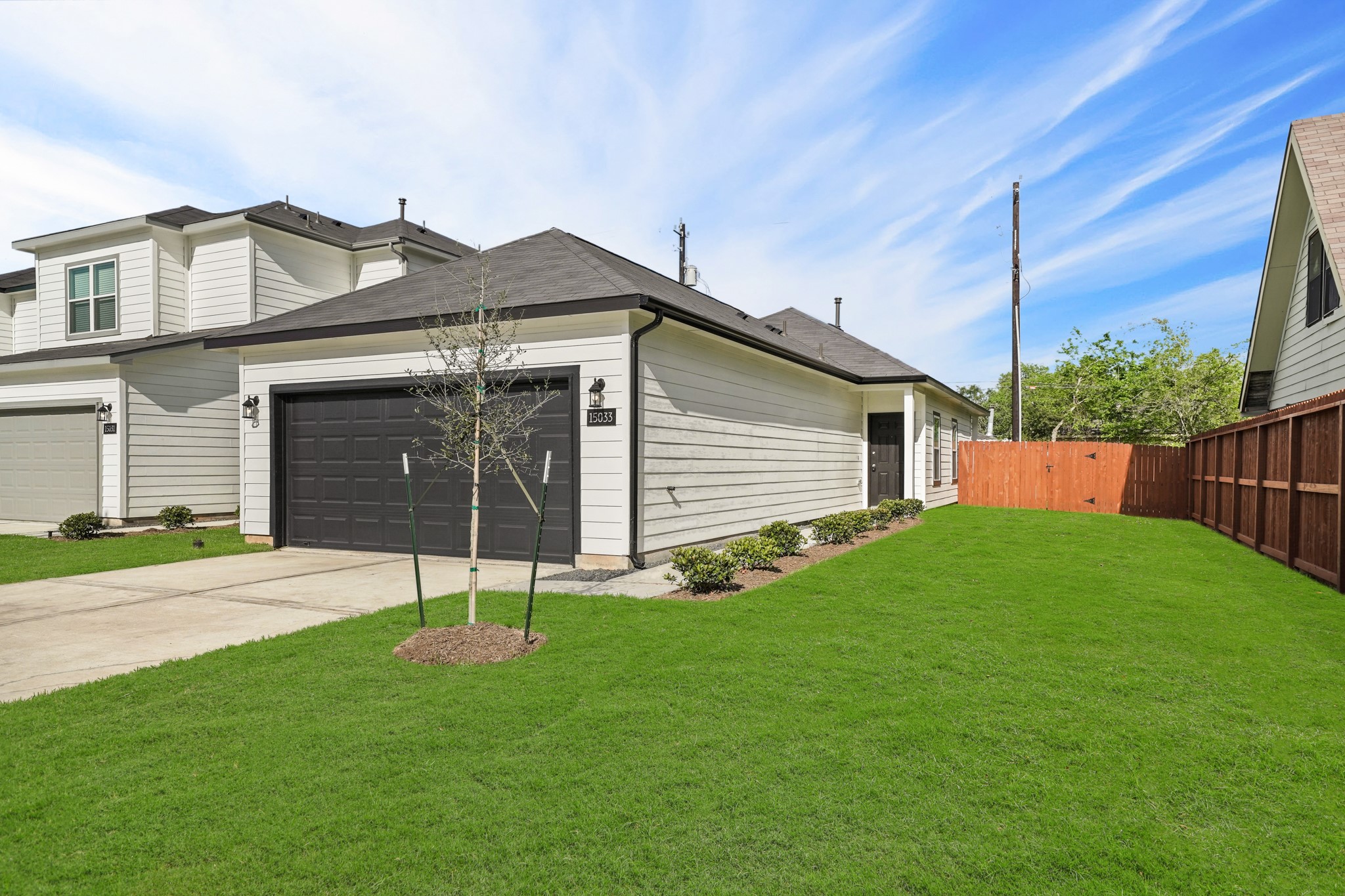 15025 Alkay Street Houston, TX 77053 - Photo 1 of 11 a house that has a backyard
