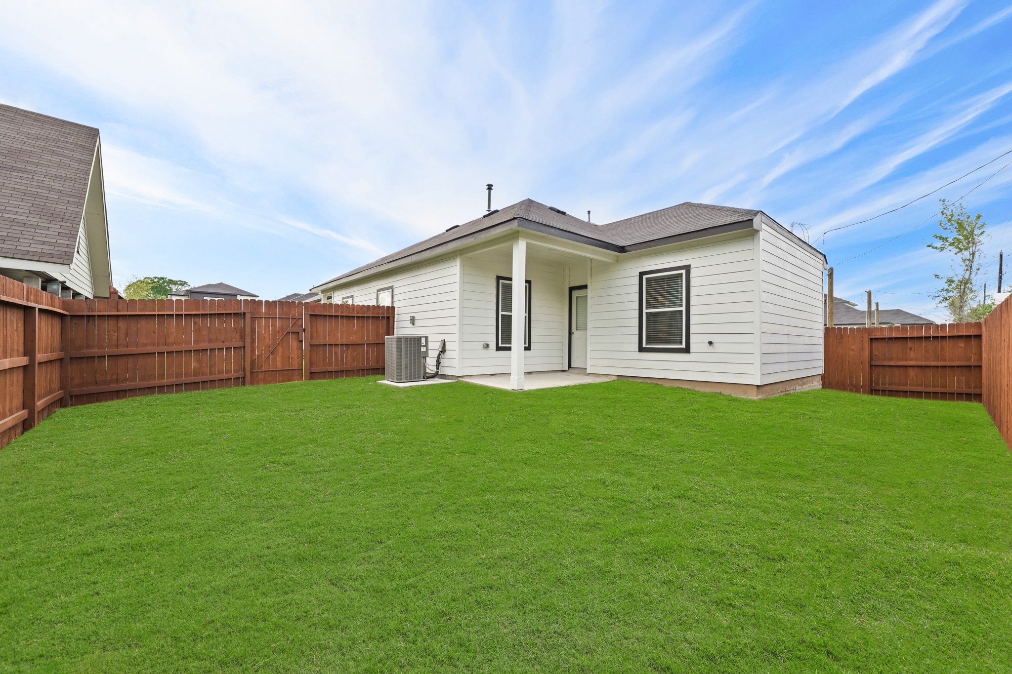 15025 Alkay Street Houston, TX 77053 - Photo 11 of 11 a front view of a house with garden