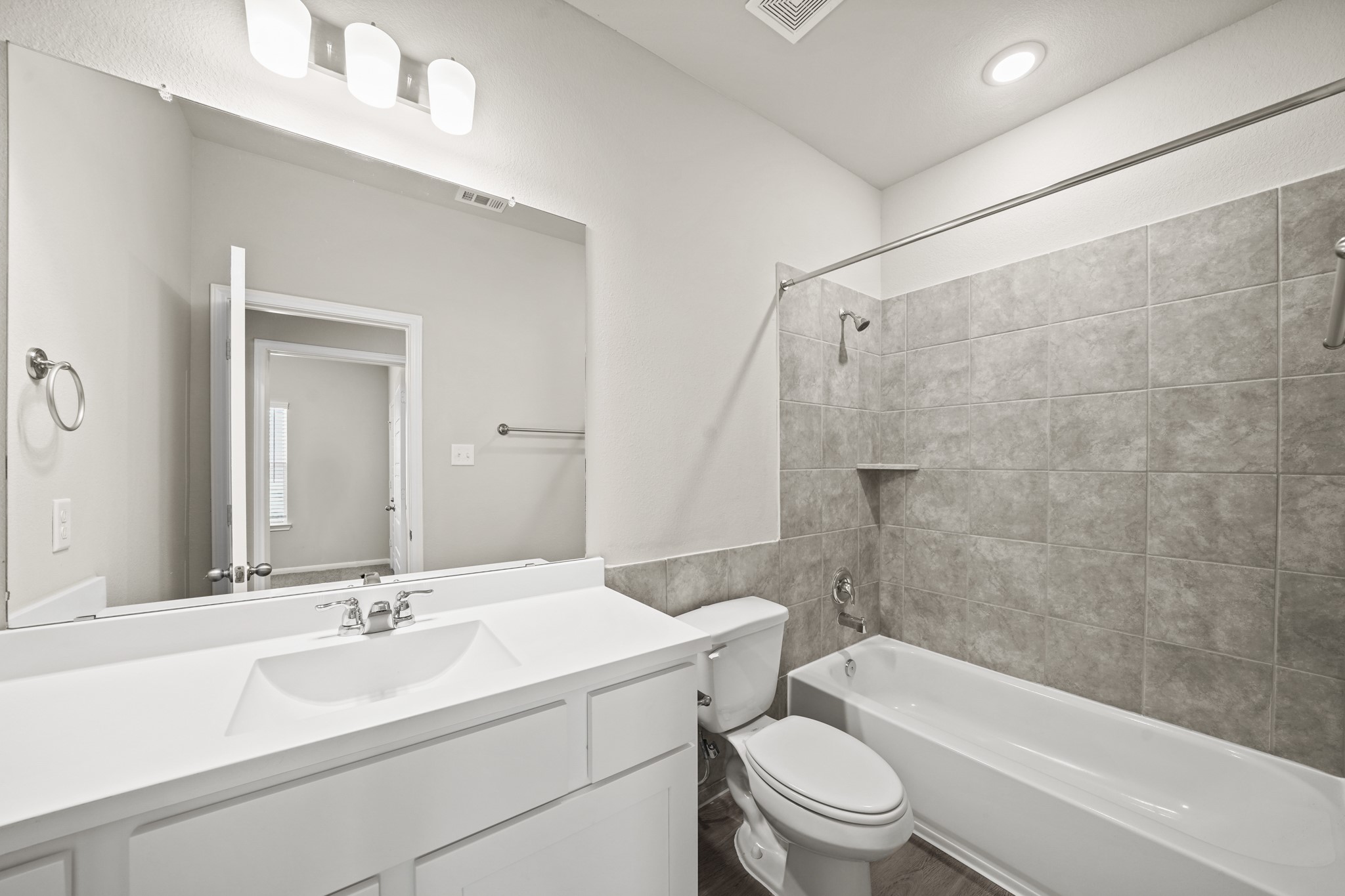 15025 Alkay Street Houston, TX 77053 - Photo 7 of 11 a bathroom with a sink a toilet and a bathtub