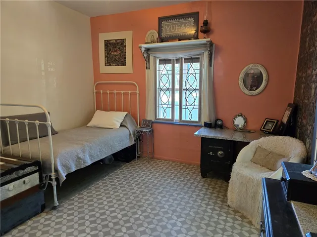 a white bath tub sitting next to a window