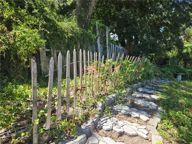 a house with trees in the background