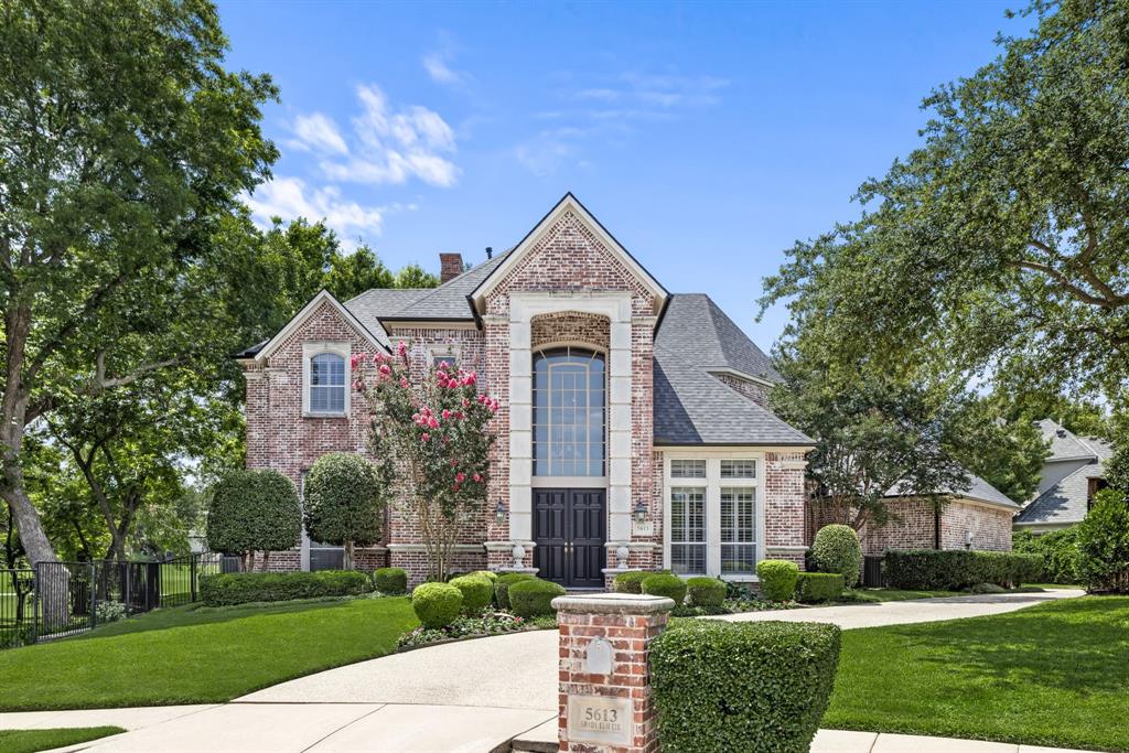 5613 Shady Elm Circle Plano, TX 75093 - Photo 1 of 1 a front view of a house with a yard