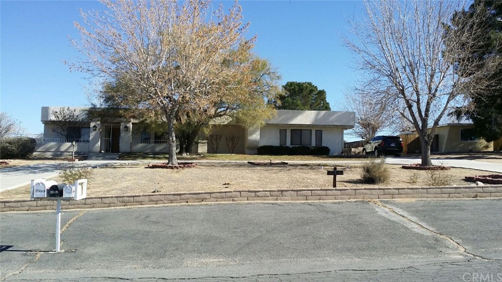 15465 Chole Road Apple Valley, CA 92307 - Photo 1 of 1 FRONT OF HOME WITH SEMI CIRCULAR DRIVEWAY PLUS LONG DRIVEWAY IDEAL FOR RV PARKING