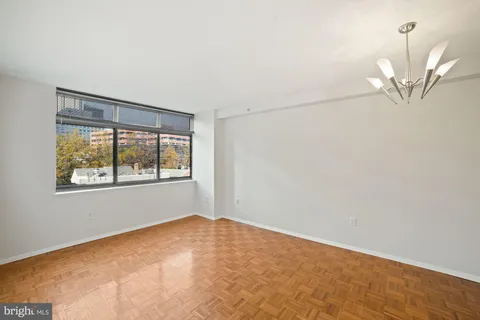 a view of a room with a large window