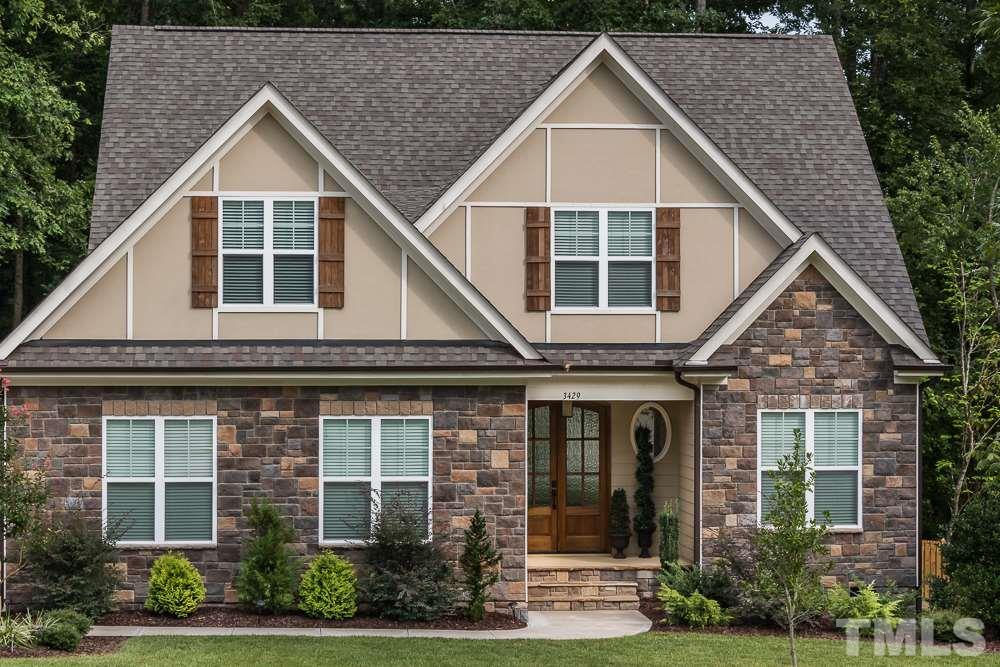 3429 Griffice Mill Road Raleigh, NC 27610 - Photo 1 of 25 a view of a house with brick walls and plants
