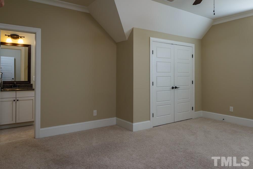 3429 Griffice Mill Road Raleigh, NC 27610 - Photo 18 of 25 a view of an empty room with a bathroom