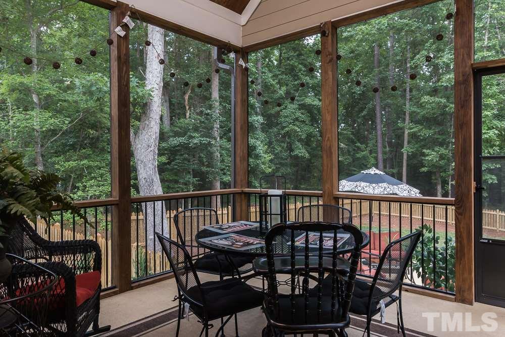 3429 Griffice Mill Road Raleigh, NC 27610 - Photo 22 of 25 a view of a chair and table in the balcony