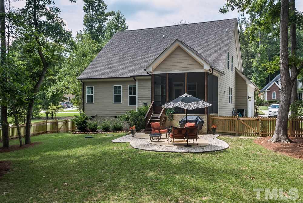 3429 Griffice Mill Road Raleigh, NC 27610 - Photo 25 of 25 a view of a house with backyard and sitting area
