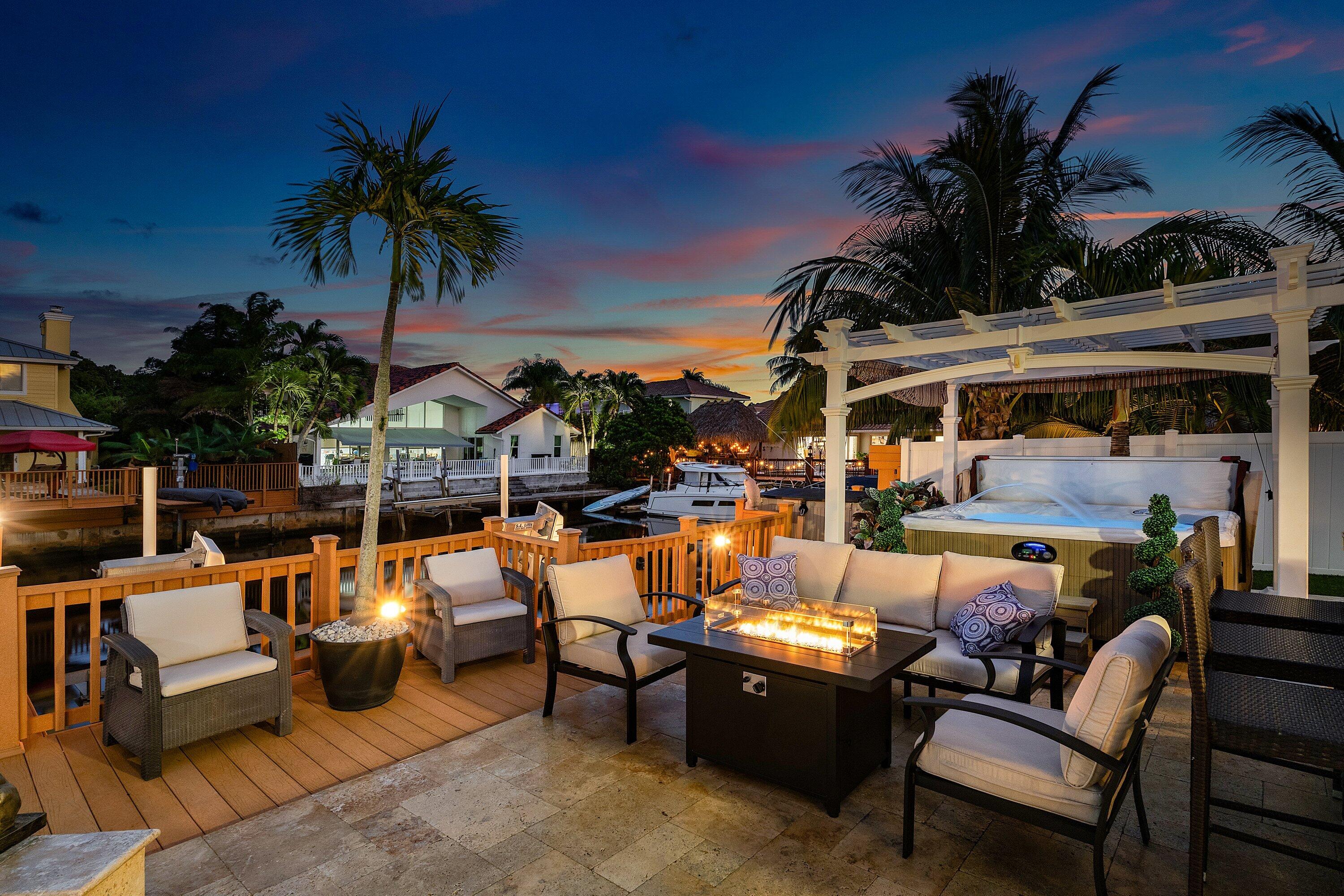 1548 Southwest 5th Avenue Boca Raton, FL 33432 - Photo 30 of 64 a view of outdoor space yard swimming pool and furniture