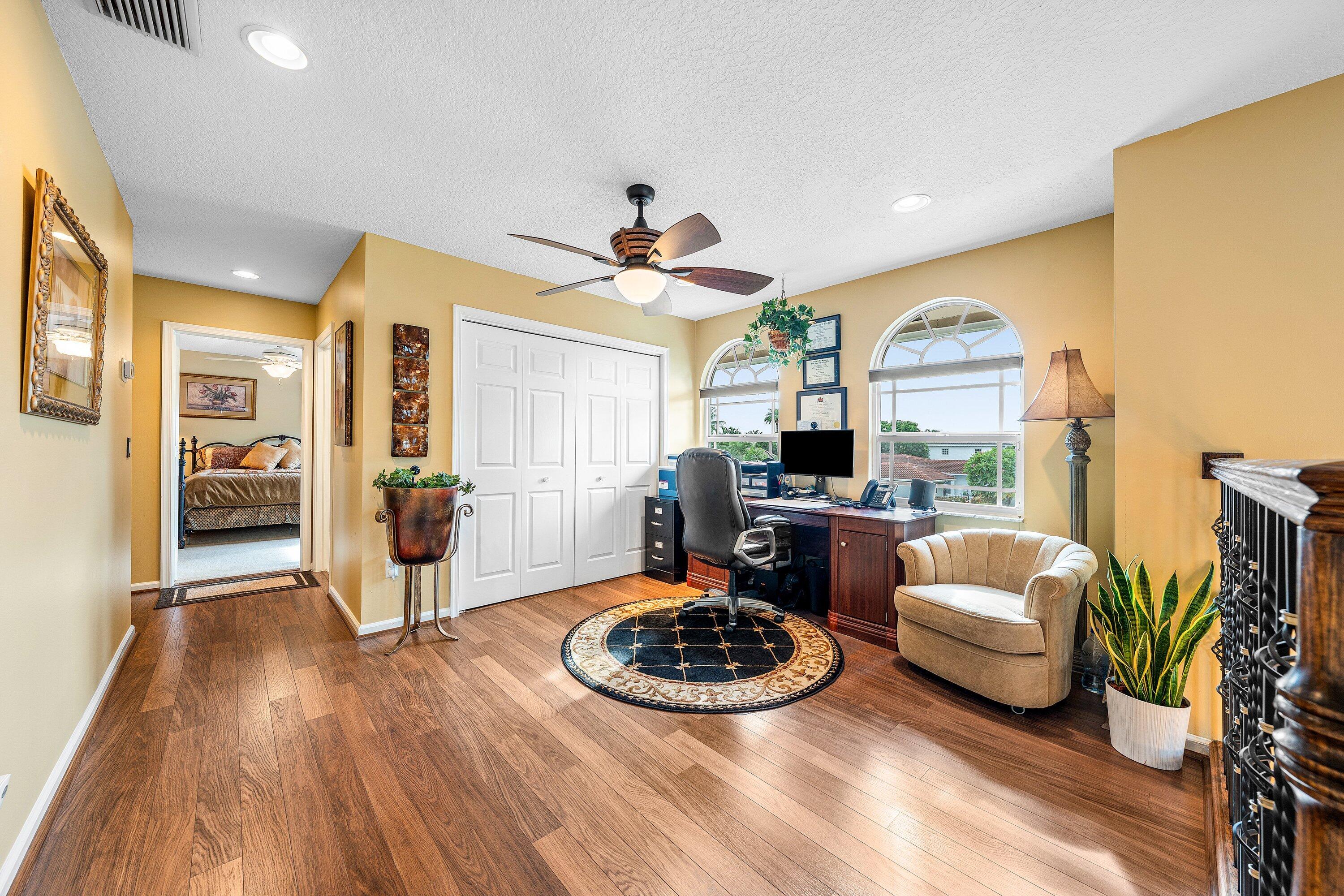 1548 Southwest 5th Avenue Boca Raton, FL 33432 - Photo 52 of 64 a living room with furniture and a wooden floor