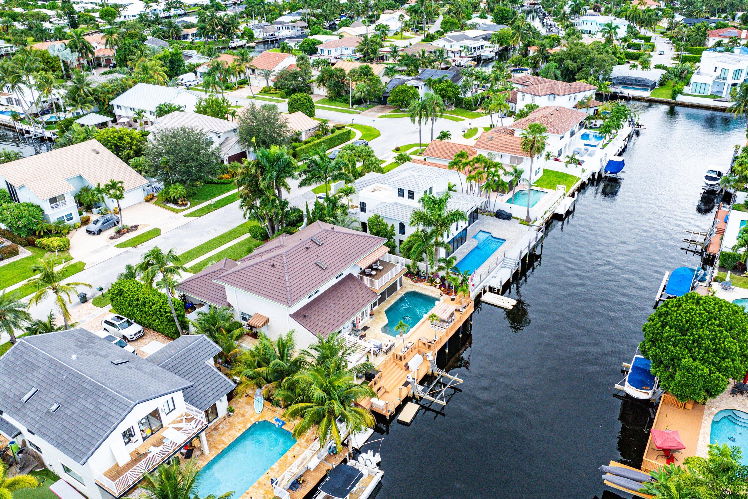 1548 Southwest 5th Avenue Boca Raton, FL 33432 - Photo 59 of 64 an aerial view of a house a garden and swimming pool