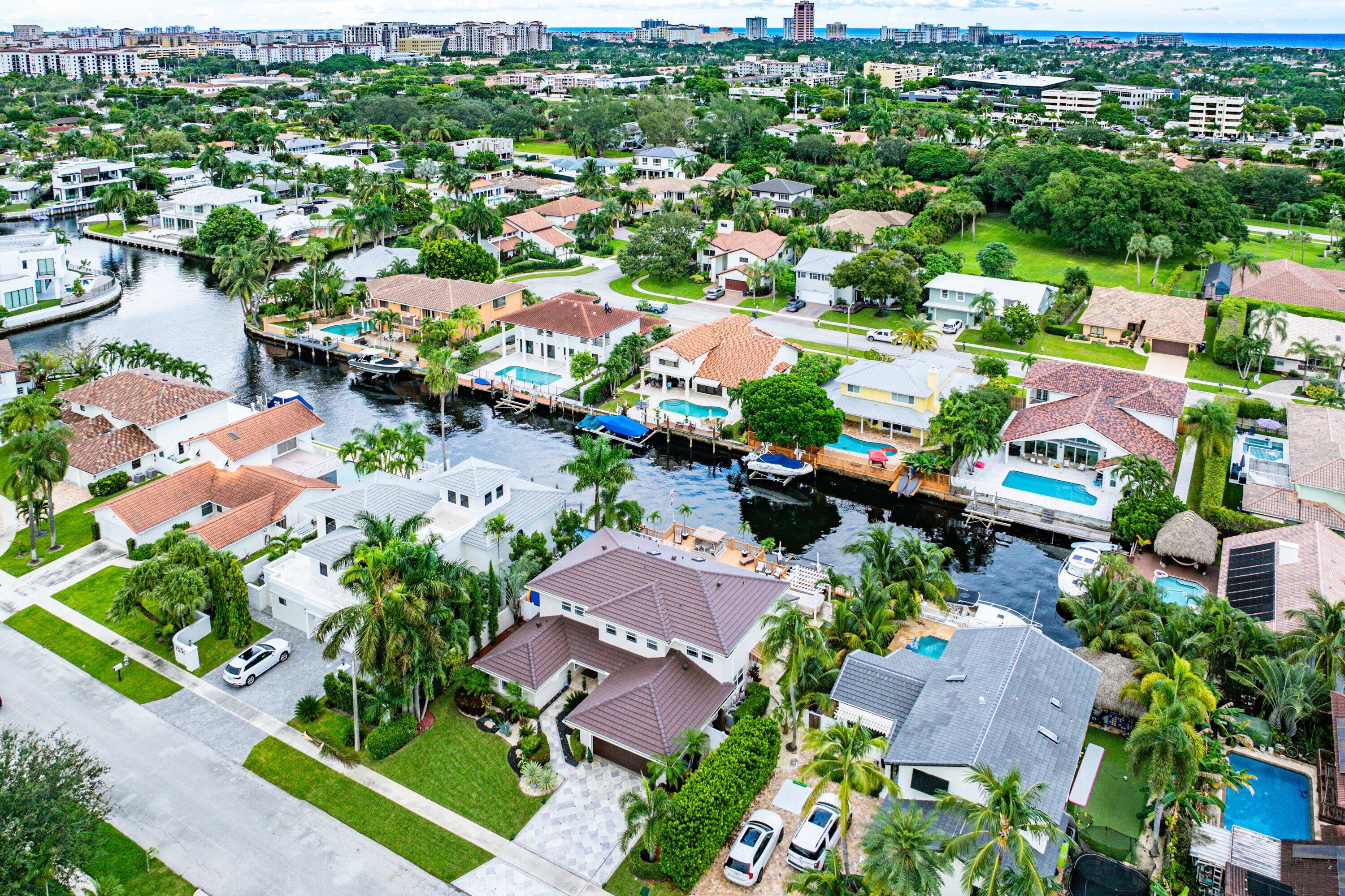 1548 Southwest 5th Avenue Boca Raton, FL 33432 - Photo 63 of 64 an aerial view of residential houses with outdoor space