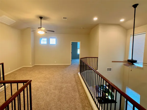 a view of a hallway with entryway