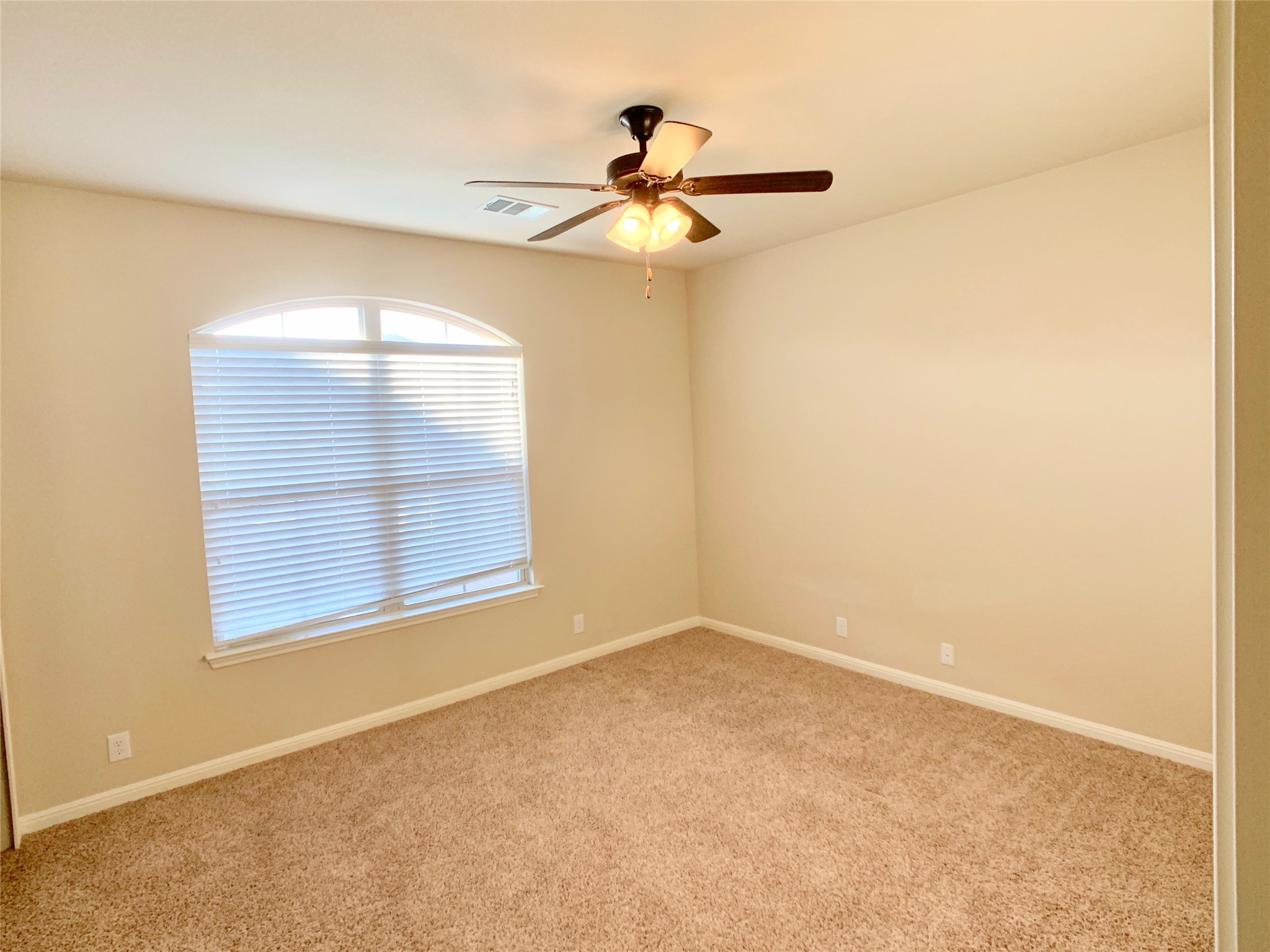 14001 Avery Ranch Boulevard, Unit 1204 Austin, TX 78717 - Photo 13 of 18 an empty room with a window